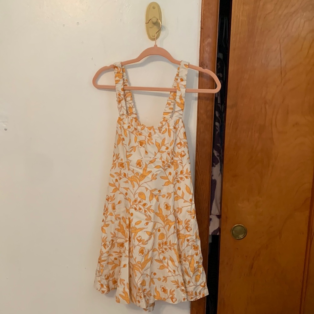Mid length dress , cross back
